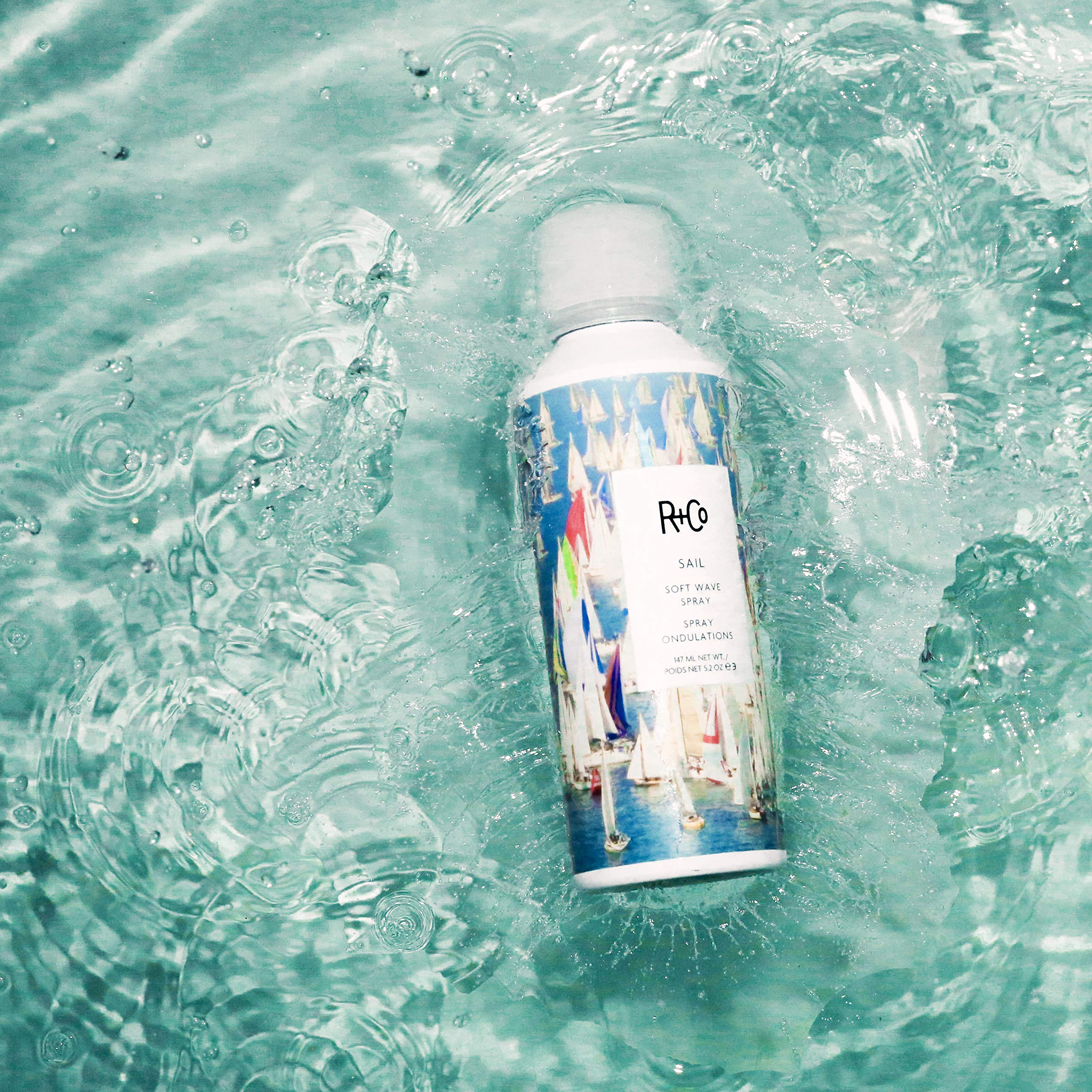 R+Co Sail Soft Wave Spray hair flow captures natural volume and sheen.