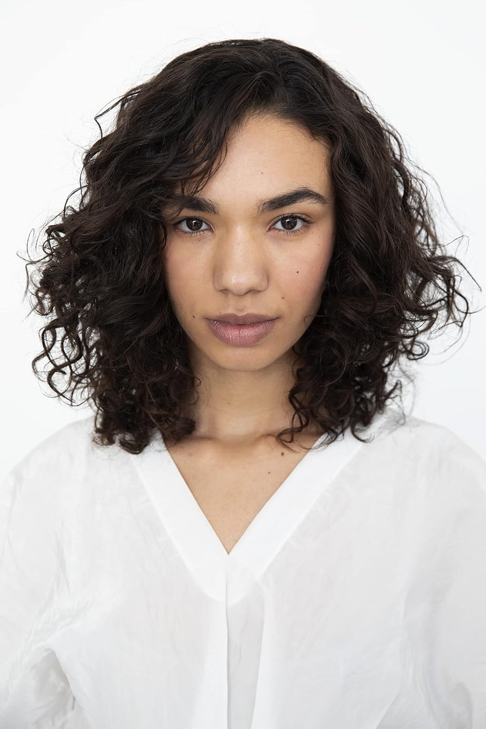 R+Co Superseed Oil Complex ingredient close-up signals nourishment for healthy-looking hair.