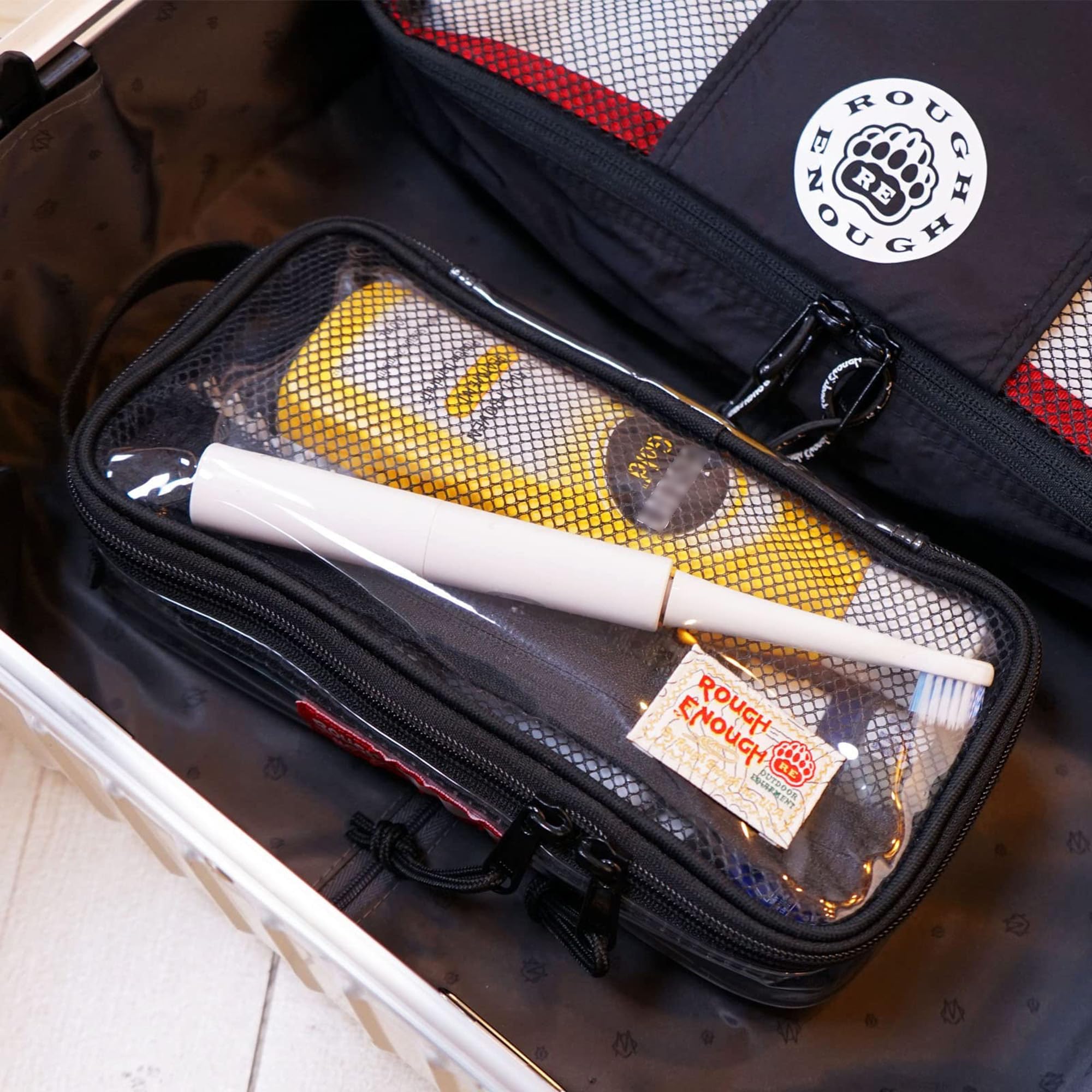 RE ROUGH ENOUGH name-tag front-label helps quick identification during travel.