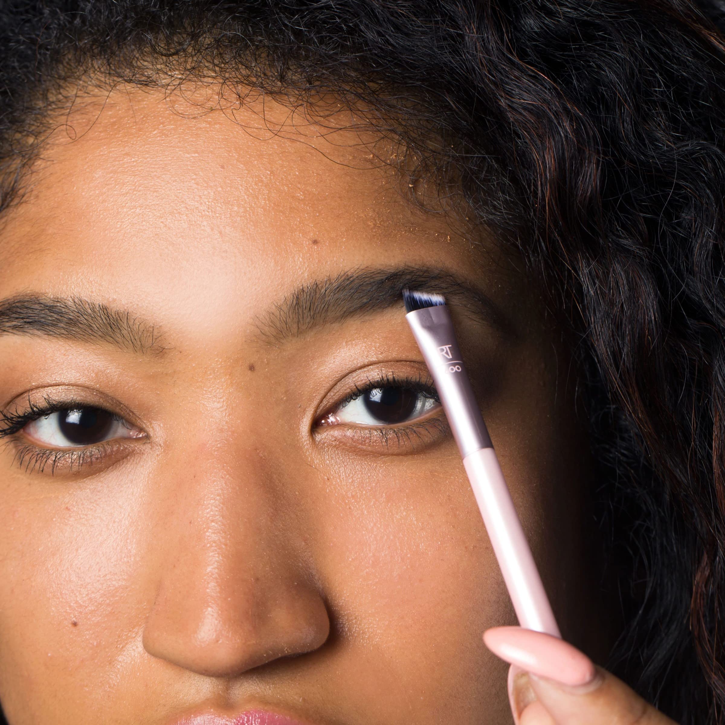 Real Techniques Brow Styling Set cruelty-free logo highlighting vegan brushes.