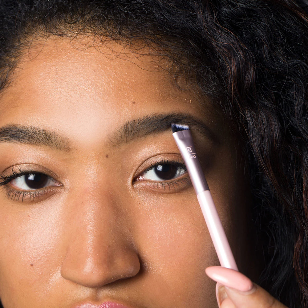 Real Techniques Brow Styling Set cruelty-free logo highlighting vegan brushes.