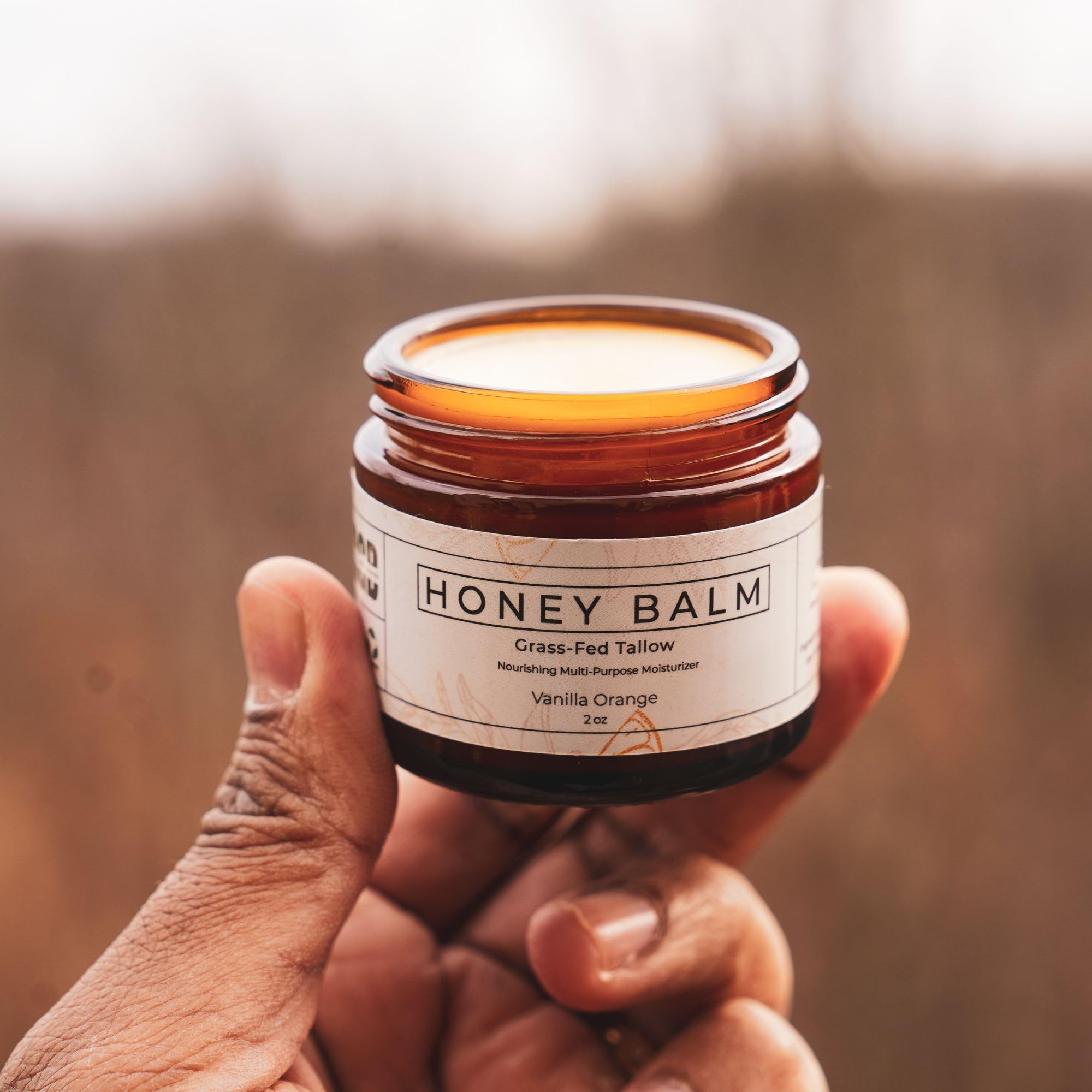 Face application of Really Good Blends Tallow Honey Balm for versatile skincare use.