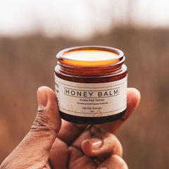 Face application of Really Good Blends Tallow Honey Balm for versatile skincare use.