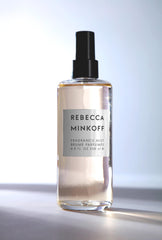 Rebecca Minkoff Body Spray bottle showcases bergamot opening for vibrant morning energy.