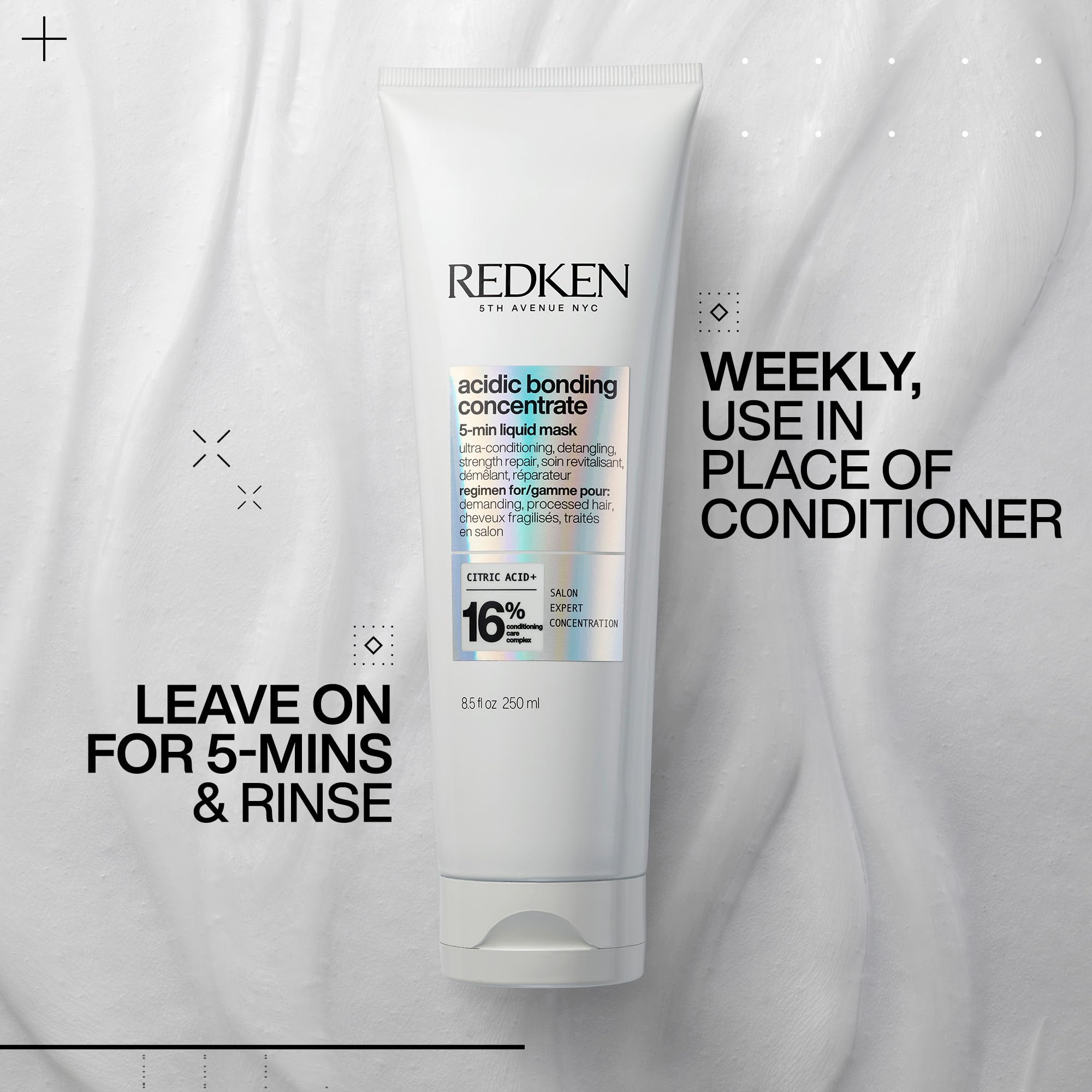 Redken applying mask to wet hair mid-lengths to ends for fast five-minute repair