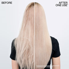Redken label close-up displaying key ingredients and conditioning complex benefits