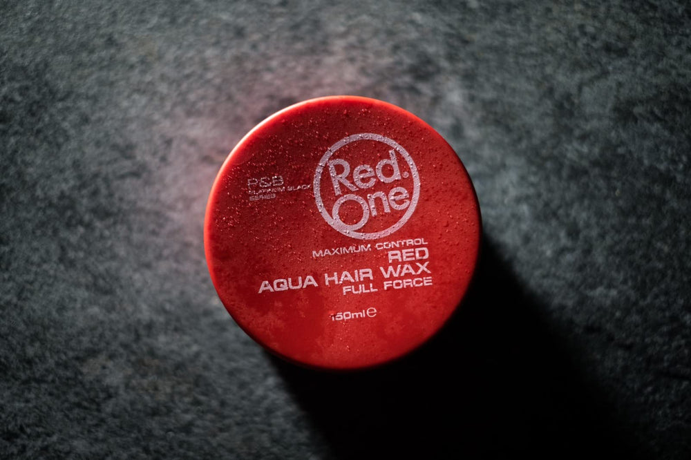 RedOne Aqua Hair Wax six-pack display emphasizes value and convenience.