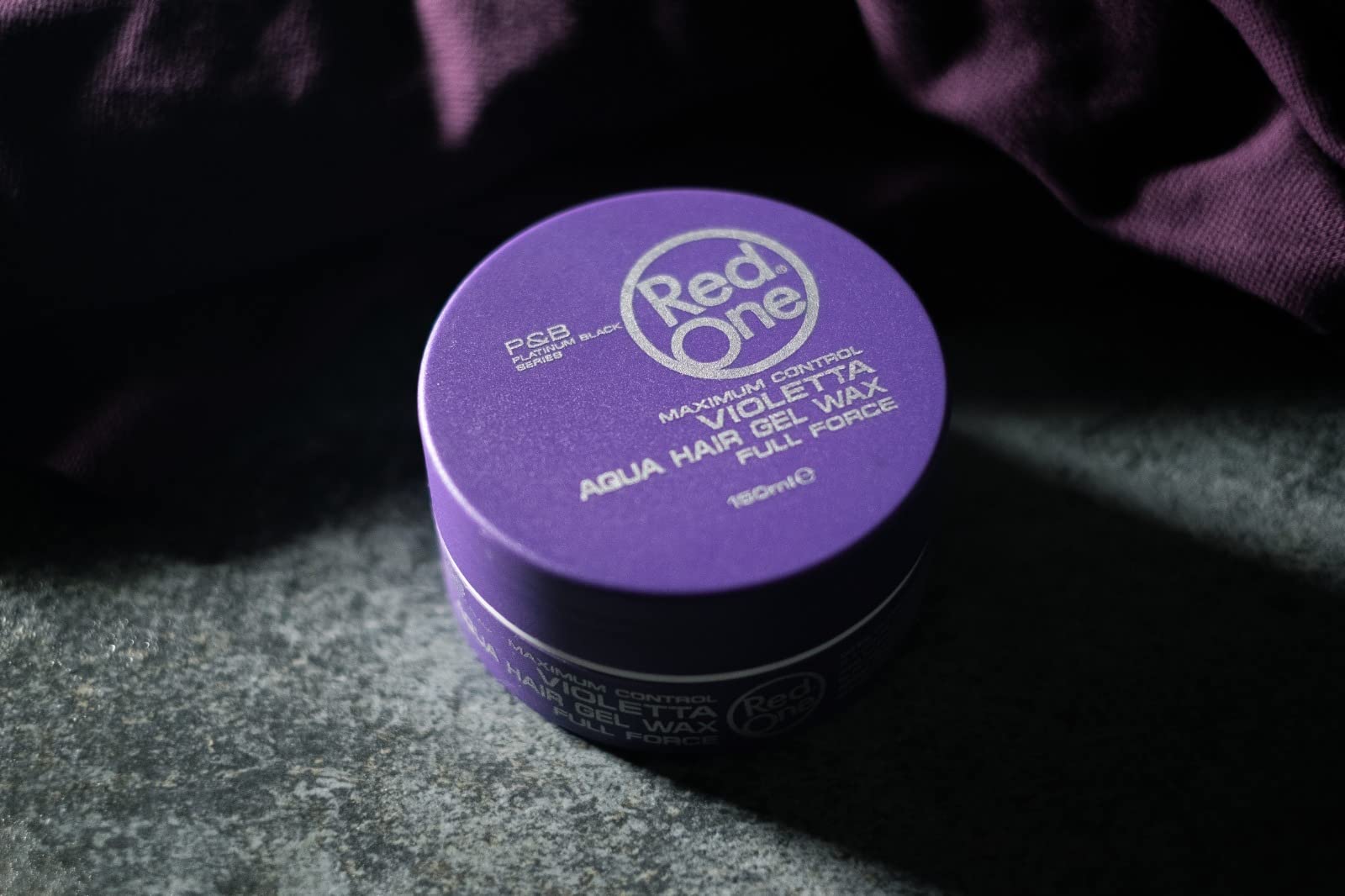Redone Violetta wax demonstrates precise hair sculpting with barber-grade control.
