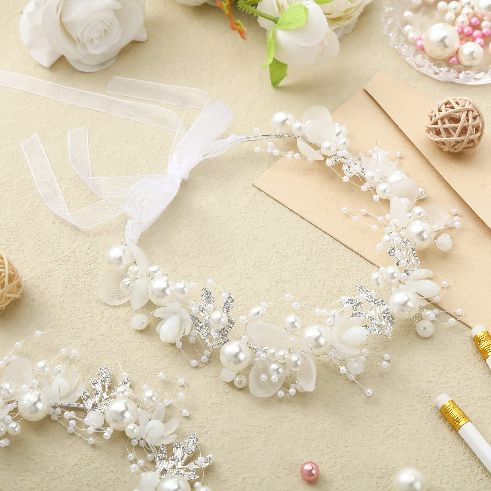 Retrowavy rhinestone flower headband close-up shows delicate crystals and sturdy base.