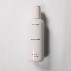 REVERIE babassu oil hair care shot emphasizes rich emollients for smoother, shinier hair.