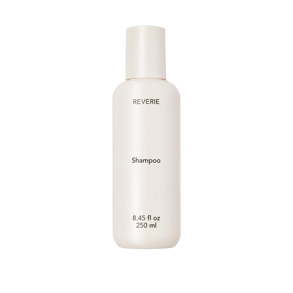 REVERIE Natural Balancing Shampoo bottle front for sulfate-free cleansing.