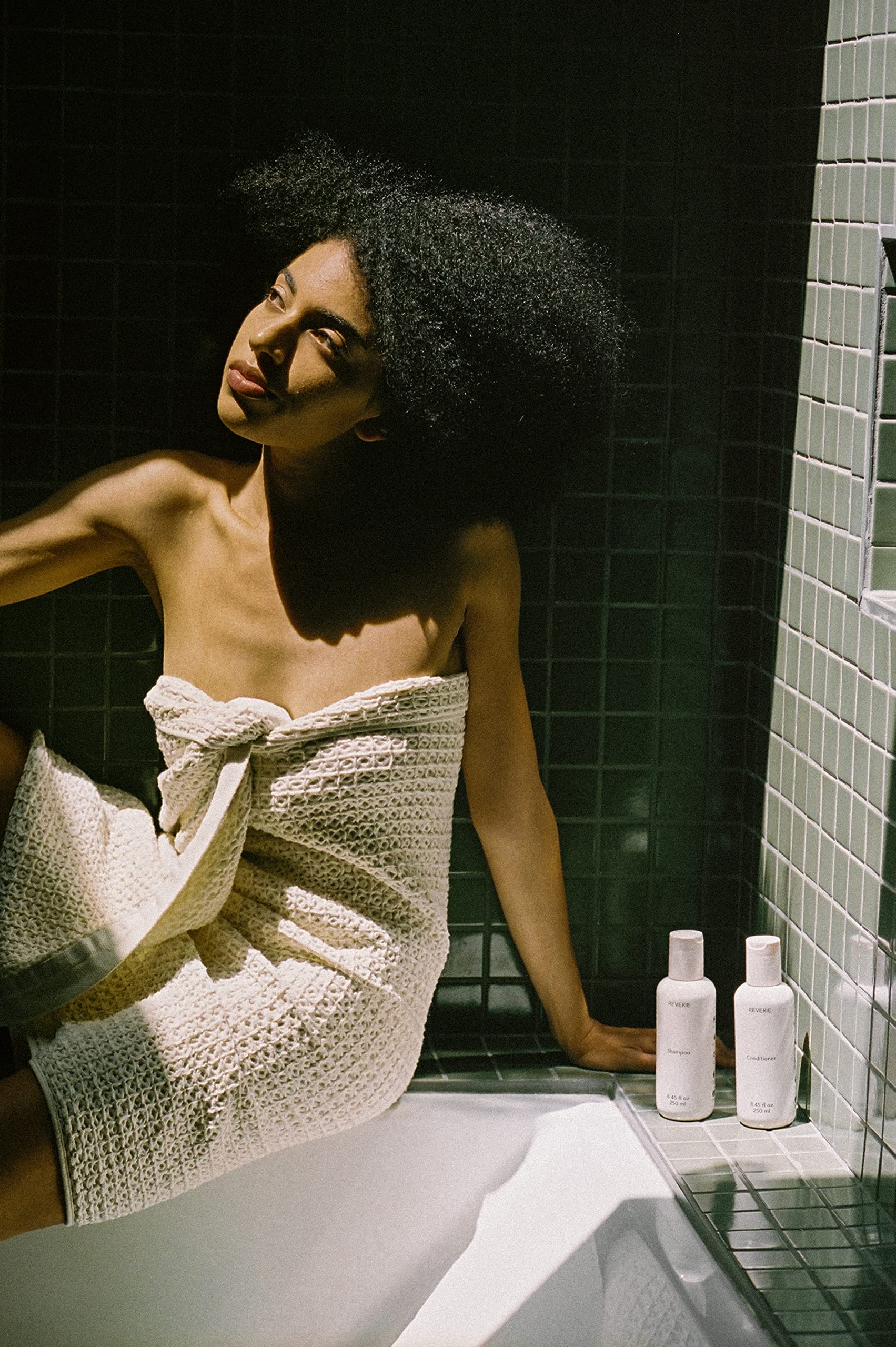 REVERIE Natural Balancing Shampoo on color-treated hair—color-safe cleansing.