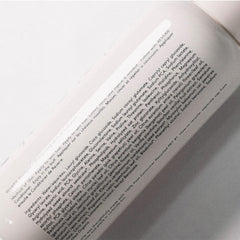 REVERIE Natural Balancing Shampoo ingredients sugar cane coconut—lather that preserves moisture.