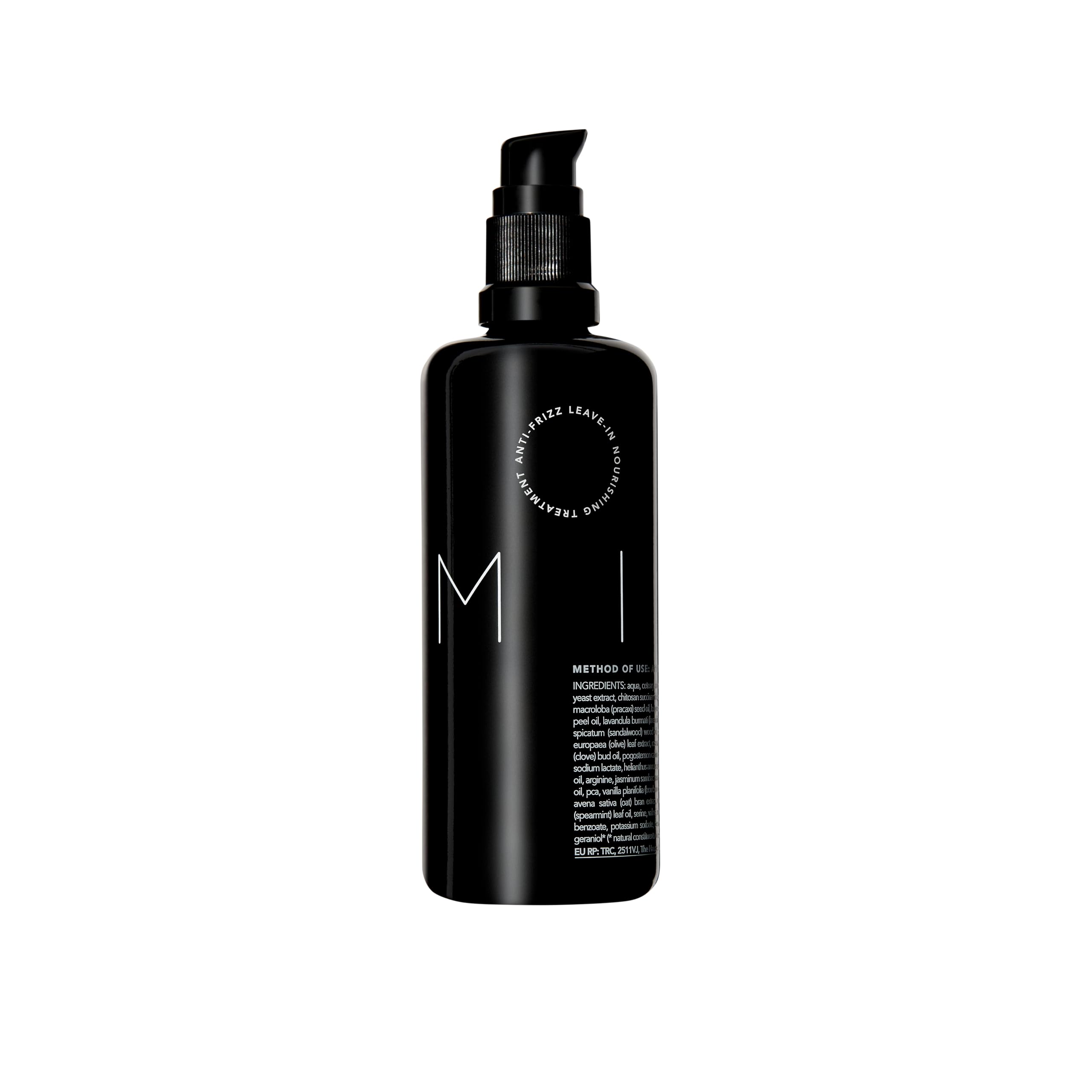 REVERIE Natural Milk Leave-In bottle pour for frizz control and lightweight hydration.
