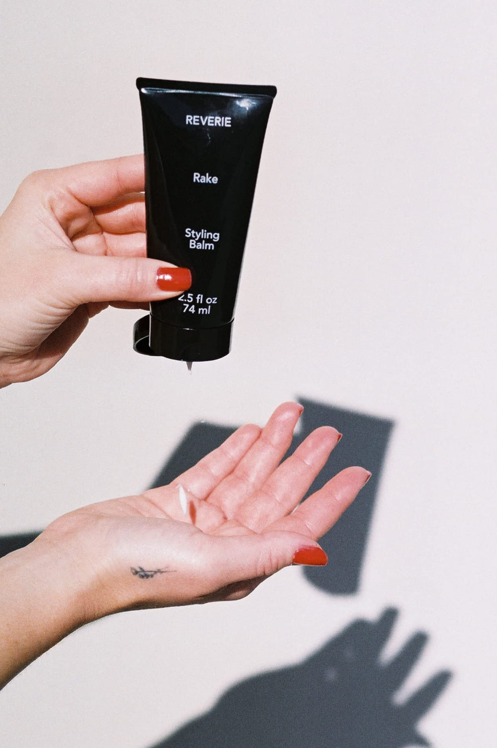 Hair air-dries into a lived-in finish with REVERIE balm