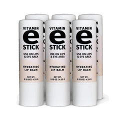 Reviva Labs Vitamin E Stick on lips delivering hydration with a subtle natural gloss.