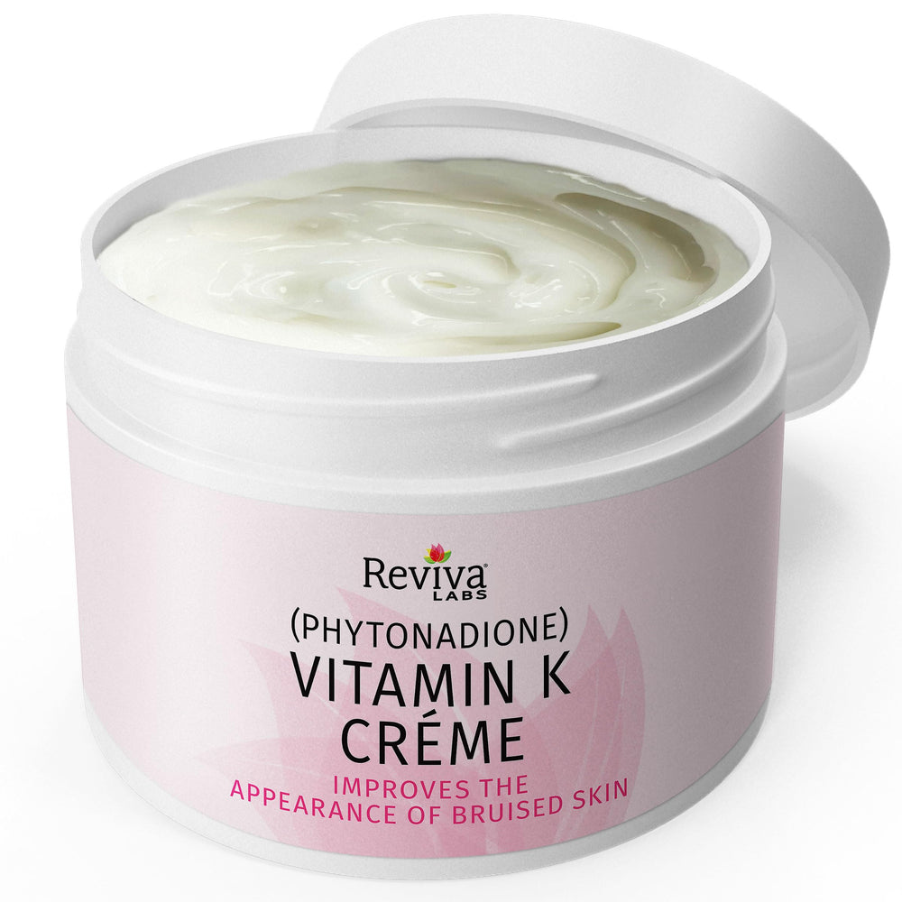 Applying Vitamin K Creme under-eye area with Reviva Labs for revitalized-looking skin