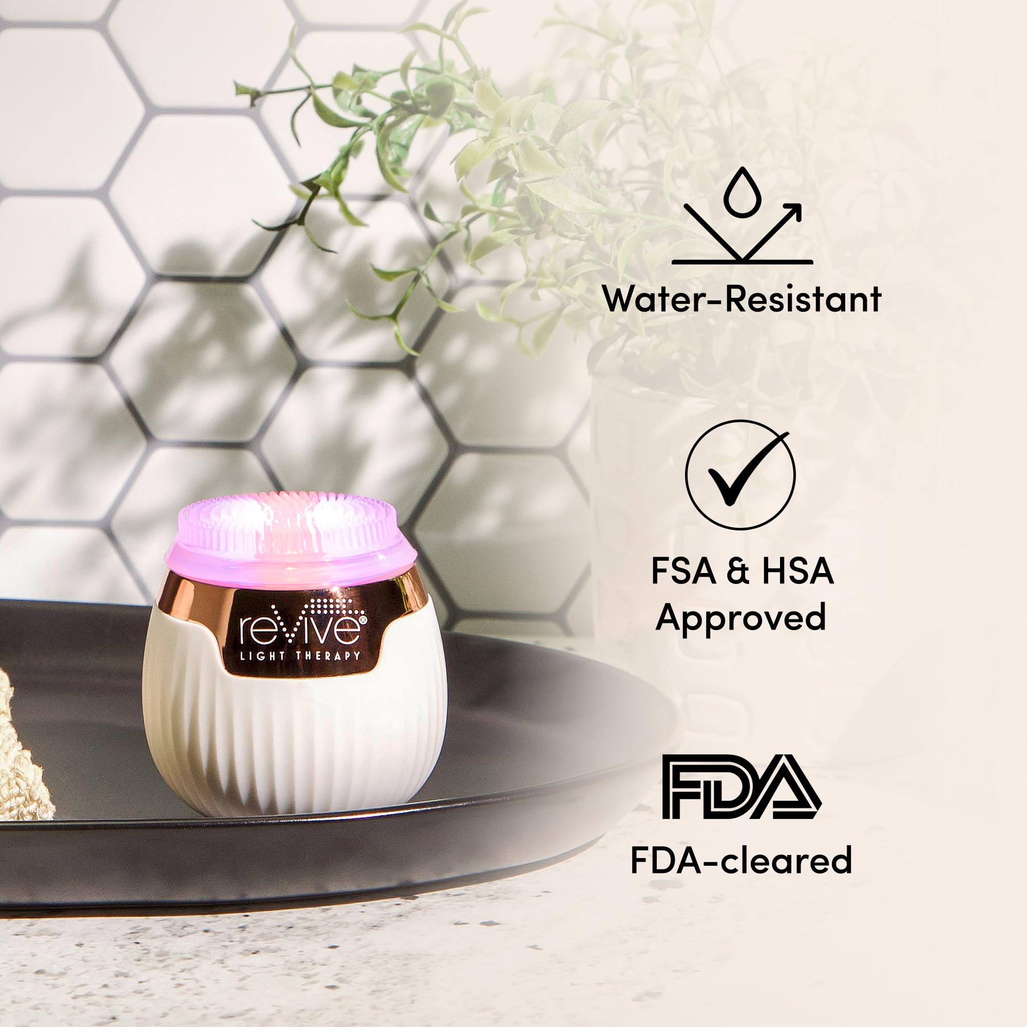 Revive Light Therapy Soniqué Mini silicone brush heads enable easy, hygienic swapping after cleansing.