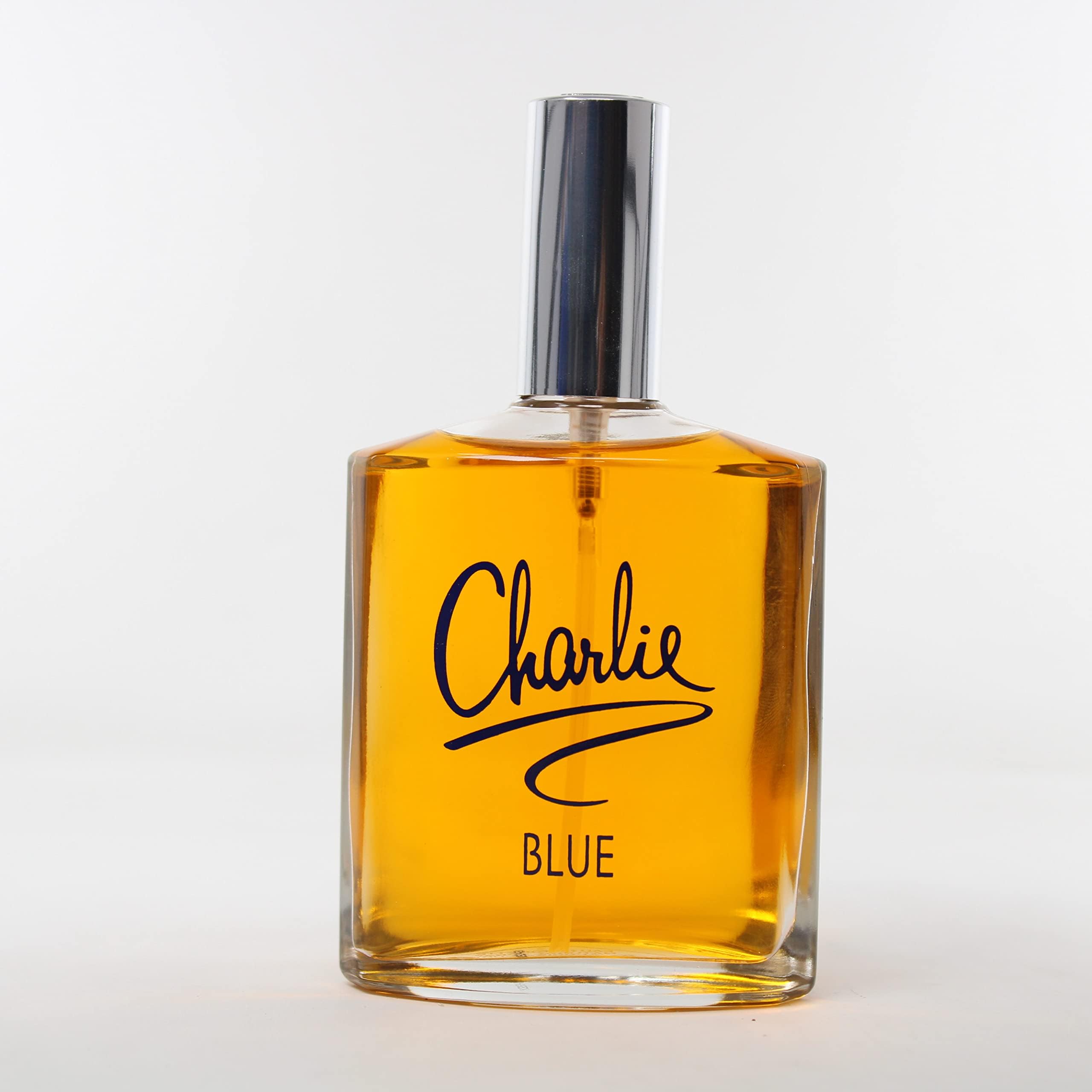 REVLON Charlie Blue spray mist in motion for fresh application.