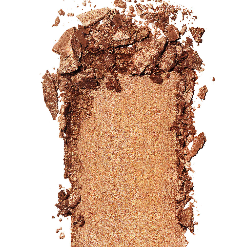 Revlon Skinlights Bronzer crystal pigments closeup shows subtle shimmer.
