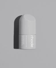 Rhode Hailey Bieber peptide glazing fluid bottle closeup reveals radiant hydration