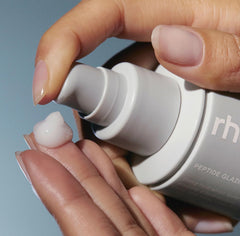 Rhode Hailey Bieber peptide glazing fluid texture closeup reveals dewy finish