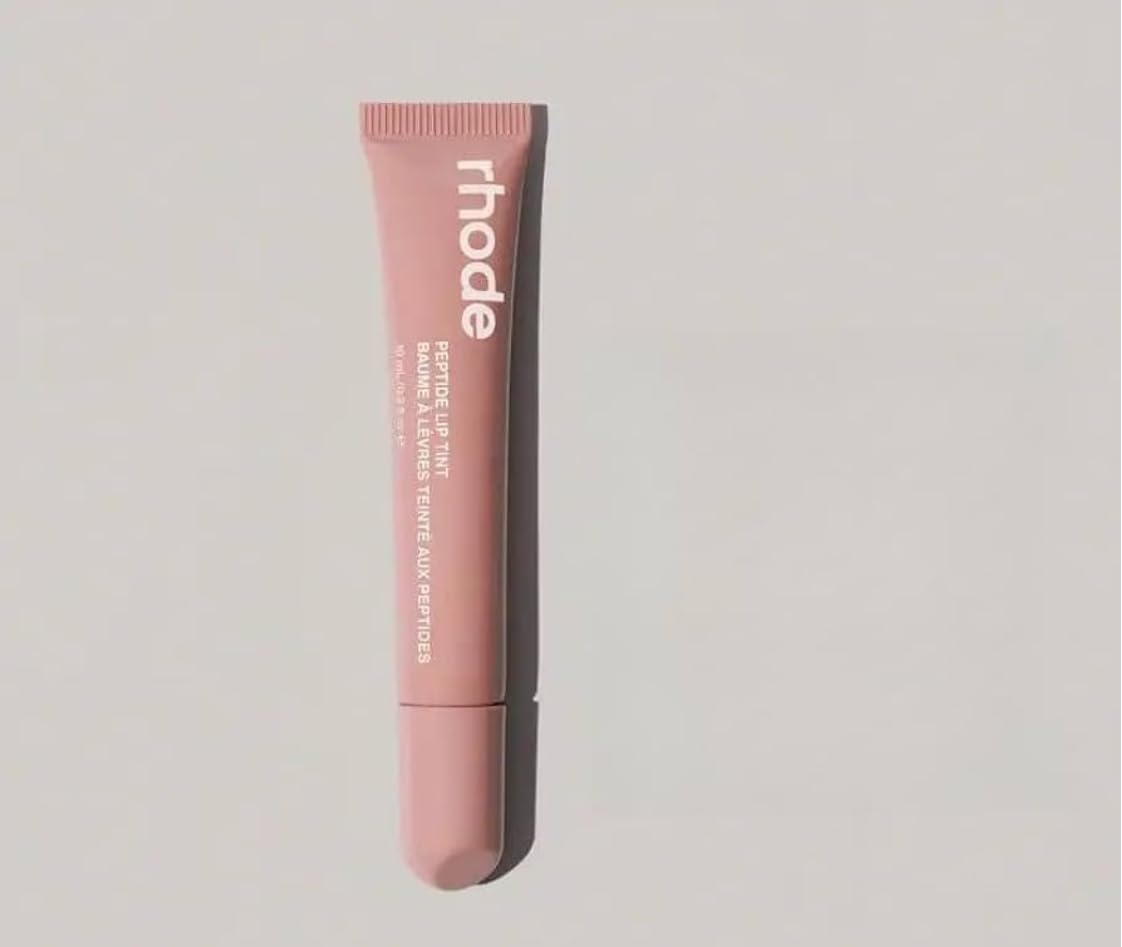 Rhode Lip Tint Toast Rose Taupe bottle offers buildable sheer color and hydrating glossy finish.