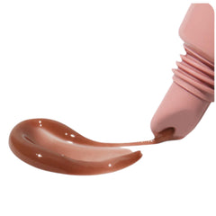 Rhode Peptide Lip Tint Toast bottle showing sleek packaging for on-the-go hydration