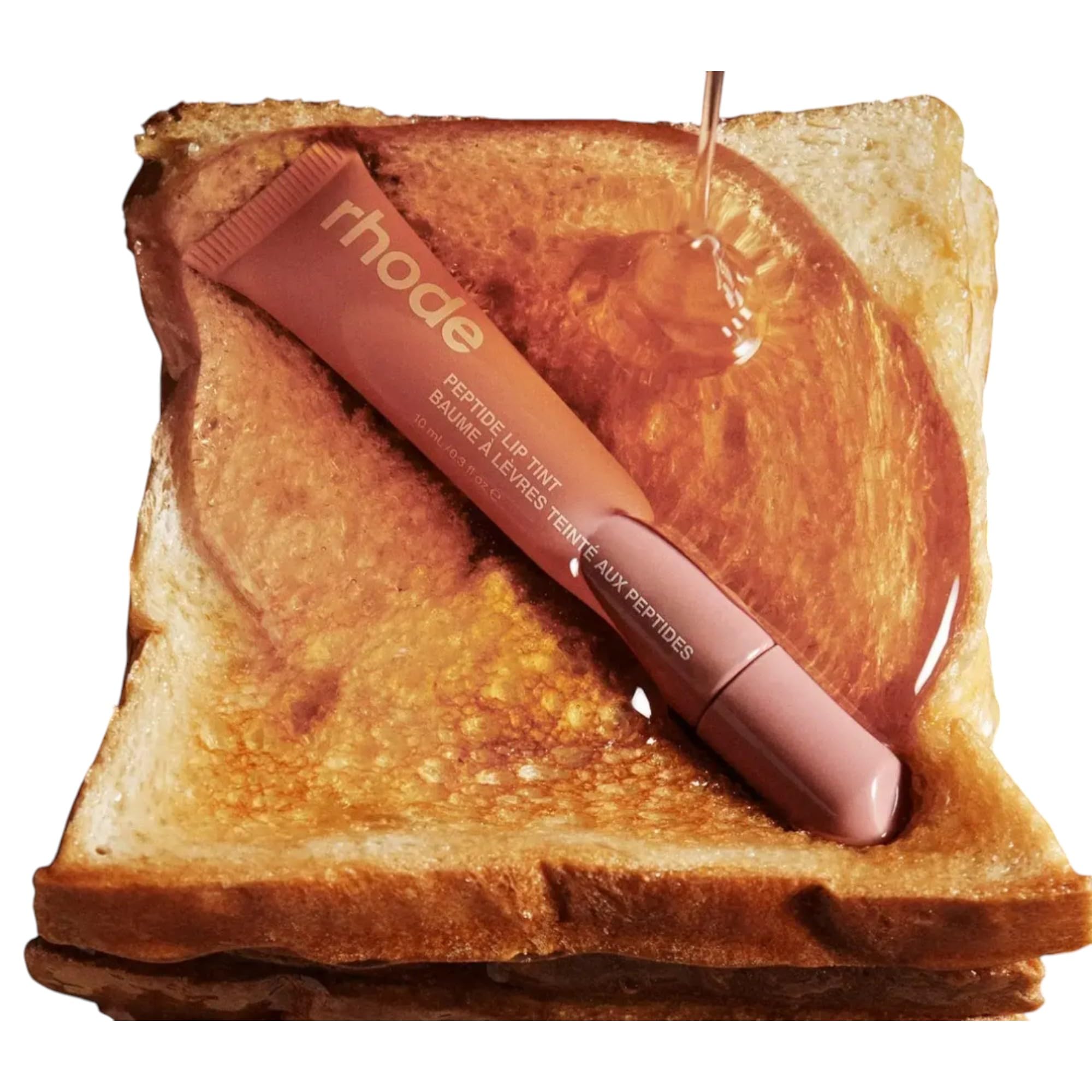 Rhode Peptide Lip Tint Toast compact packaging in purse