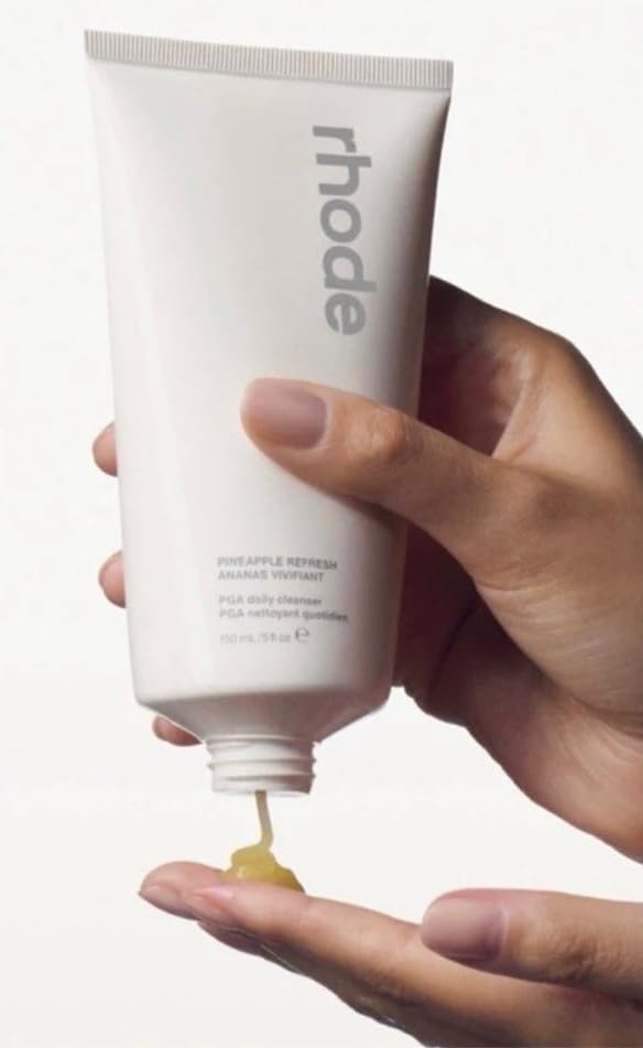 Rhode Pineapple Refresh lathering balm texture demonstrates spa-like cleansing during application.