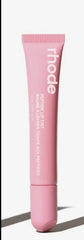 Rhode Ribbon Sheer Pink Lip Tint on lips delivering hydration and subtle plump look