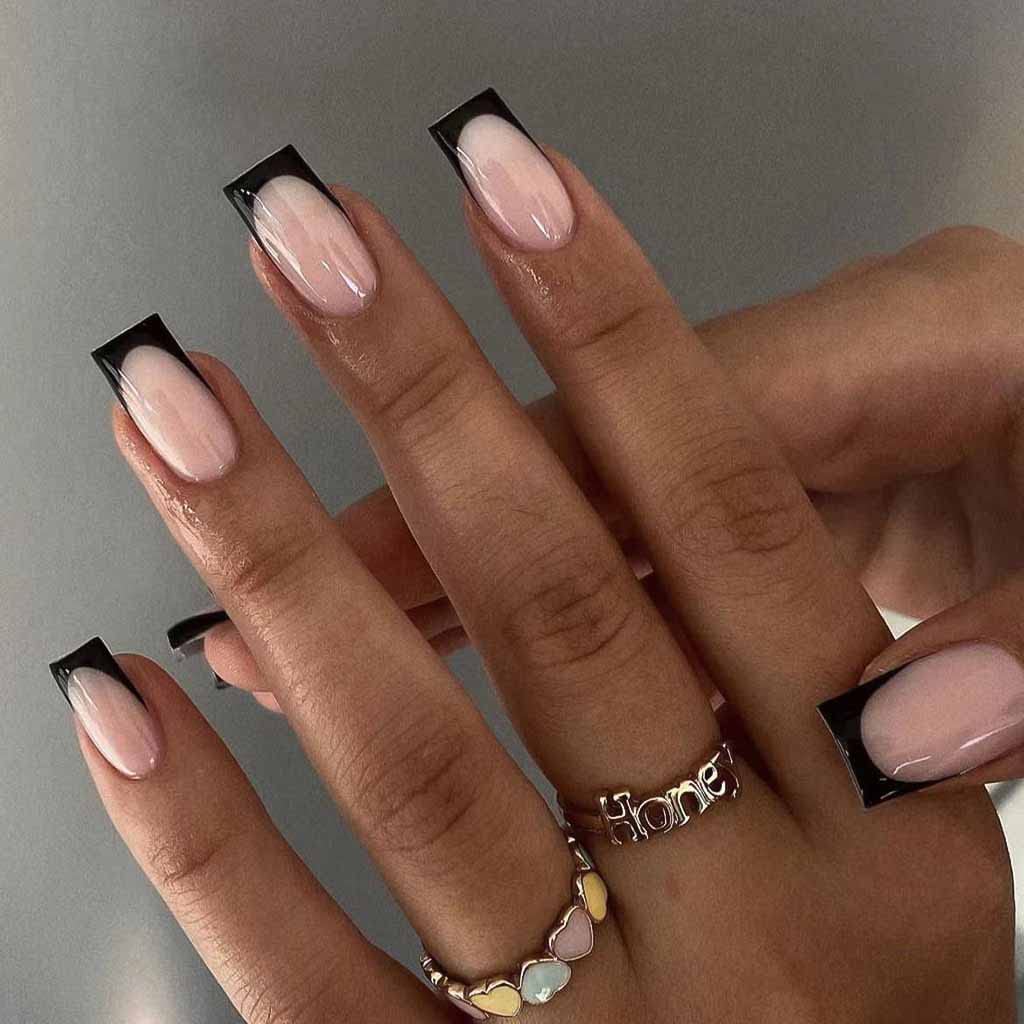 RikView French Tip press-on nails on hand for quick salon-like manicure at home