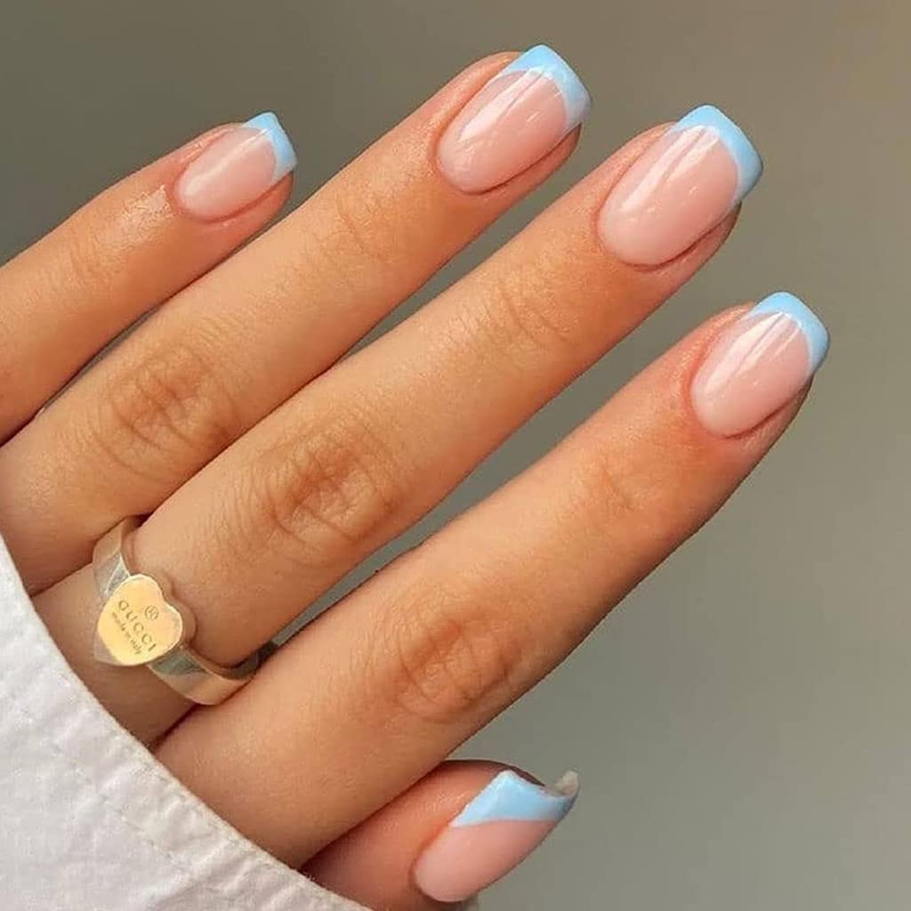 RikView press-on nails with blue French tip for quick salon-style manicure.