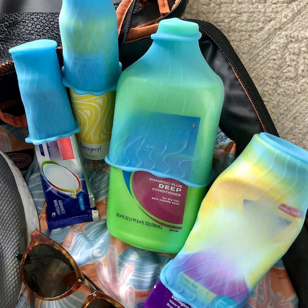 Rinseroo LeakLocks Skins nestled in a suitcase keeps toiletries neatly organized.