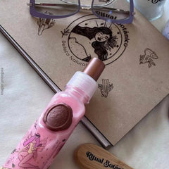 Ritual Botanico Temptation Blue bottle highlights a light scent and frizz control.