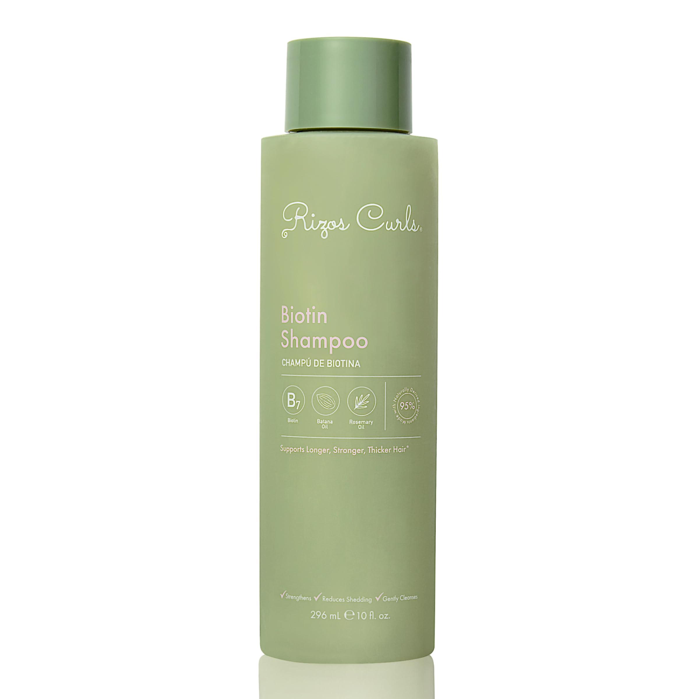 Rizos Curls Biotin Shampoo bottle close-up showing nourishing formula for fuller-looking hair