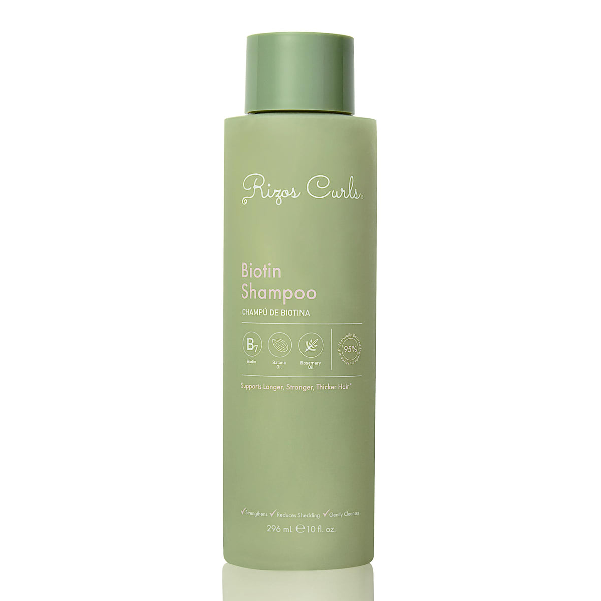 Rizos Curls Biotin Shampoo bottle close-up showing nourishing formula for fuller-looking hair