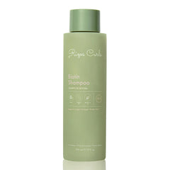 Rizos Curls Biotin Shampoo bottle close-up showing nourishing formula for fuller-looking hair
