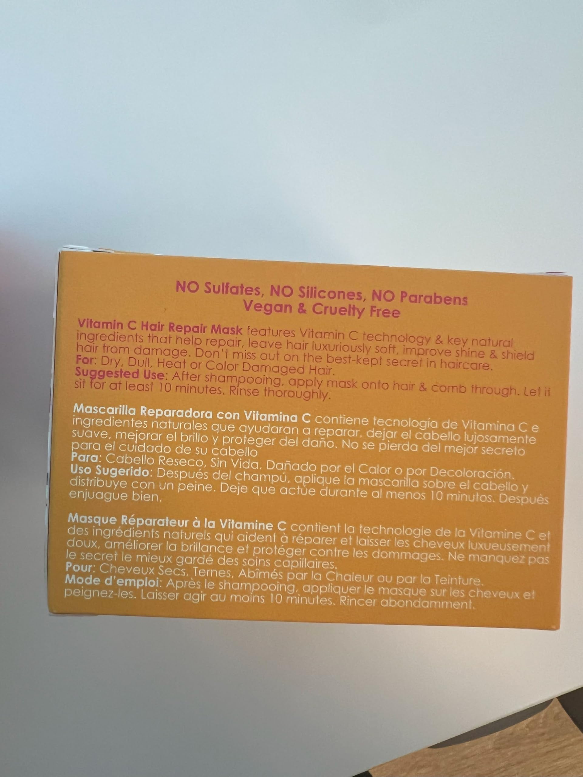 Rizos Curls Vitamin C Hair Repair Mask with grapefruit and orange oils delivers shine and nourishment.