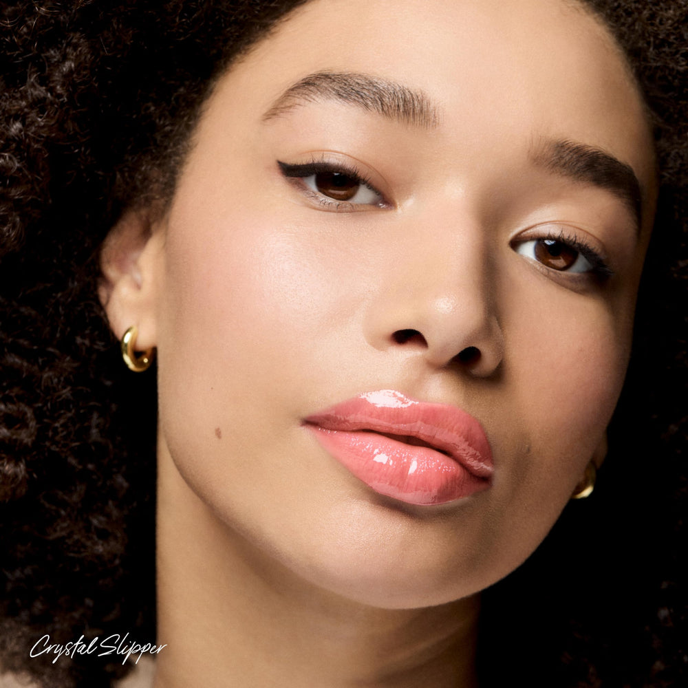 RMS Beauty Legendary Lip Oil on lips shows non-sticky shine and smooth texture.