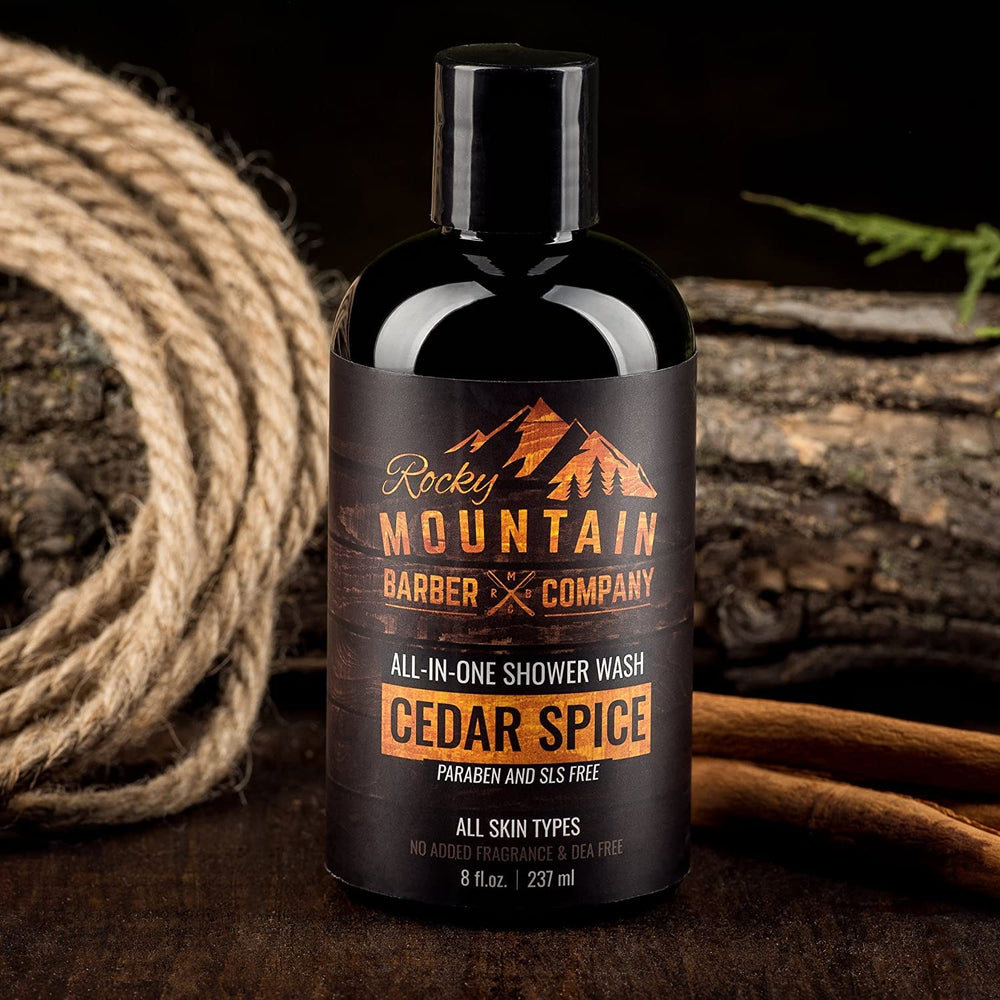 Rocky Mountain Barber Cedar Spice shampoo-wash flowing through wet hair.