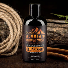 Rocky Mountain Barber Cedar Spice shampoo-wash flowing through wet hair.