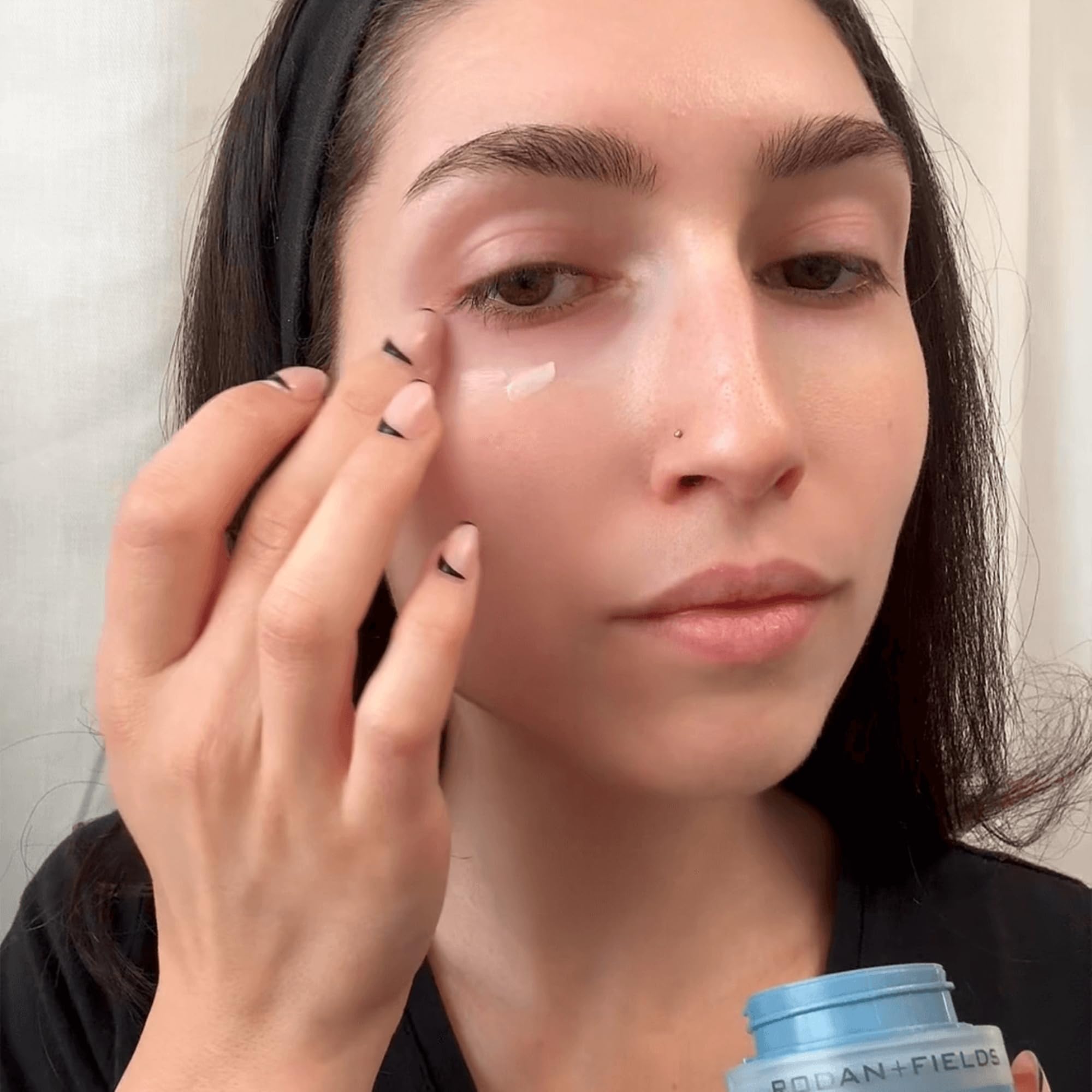 RODAN + FIELDS Redefine Eye Cream closeup jar showing premium moisturizing formula.
