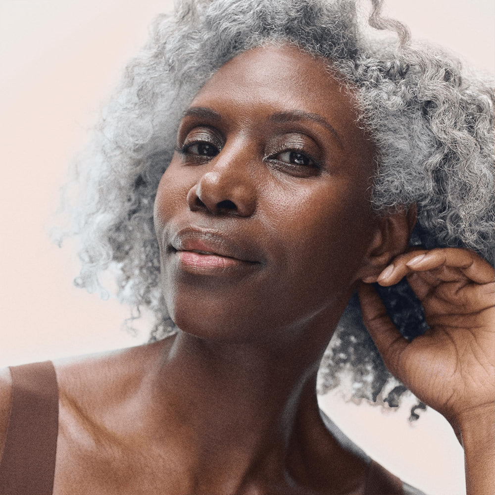 Rodan + Fields ReDefine Intensive Renewing Serum packaging on premium display