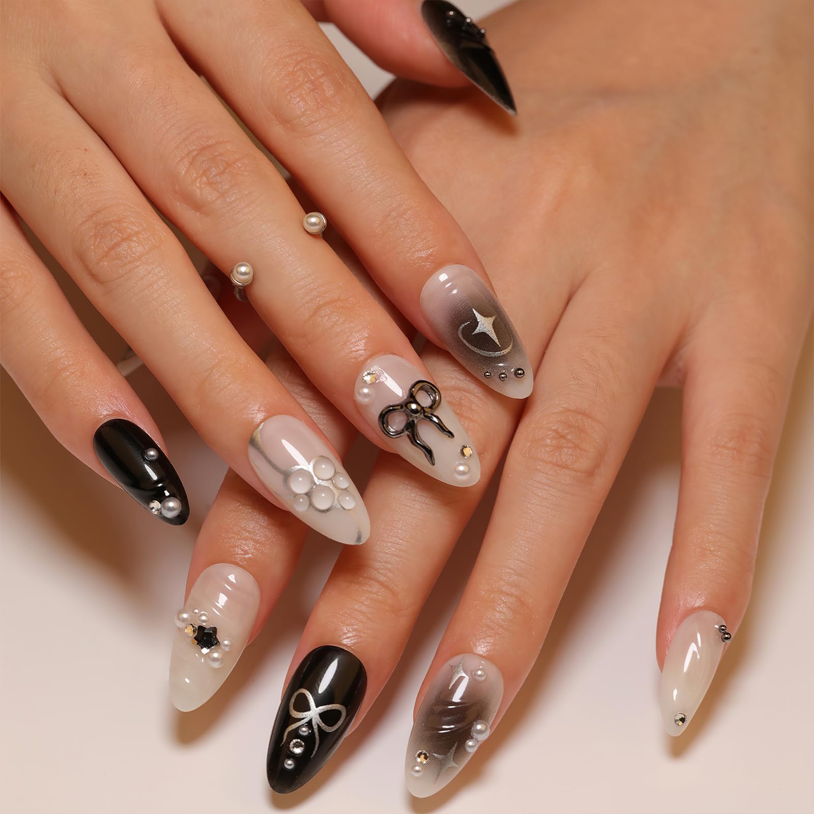 ROFIBUT 3D pearl rhinestones add luxe sparkle to nails.