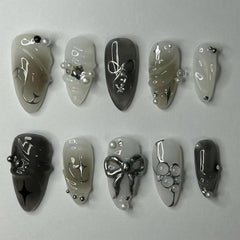 ROFIBUT black gradient press-on nails with glossy finish for quick at-home manicures.