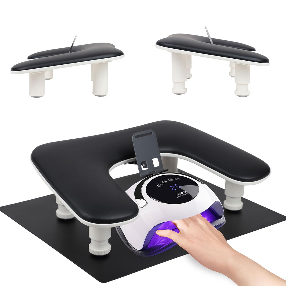 Rolomanve arm rest with foldable phone holder provides hands-free viewing during manicures.