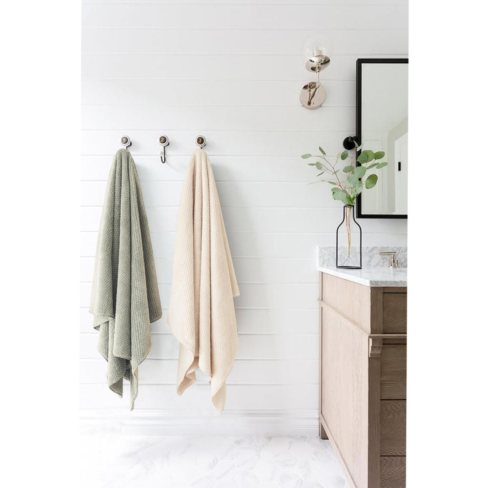 ROLSHOL green towel wrapped on head demonstrates comfortable fit during post-shower routine.
