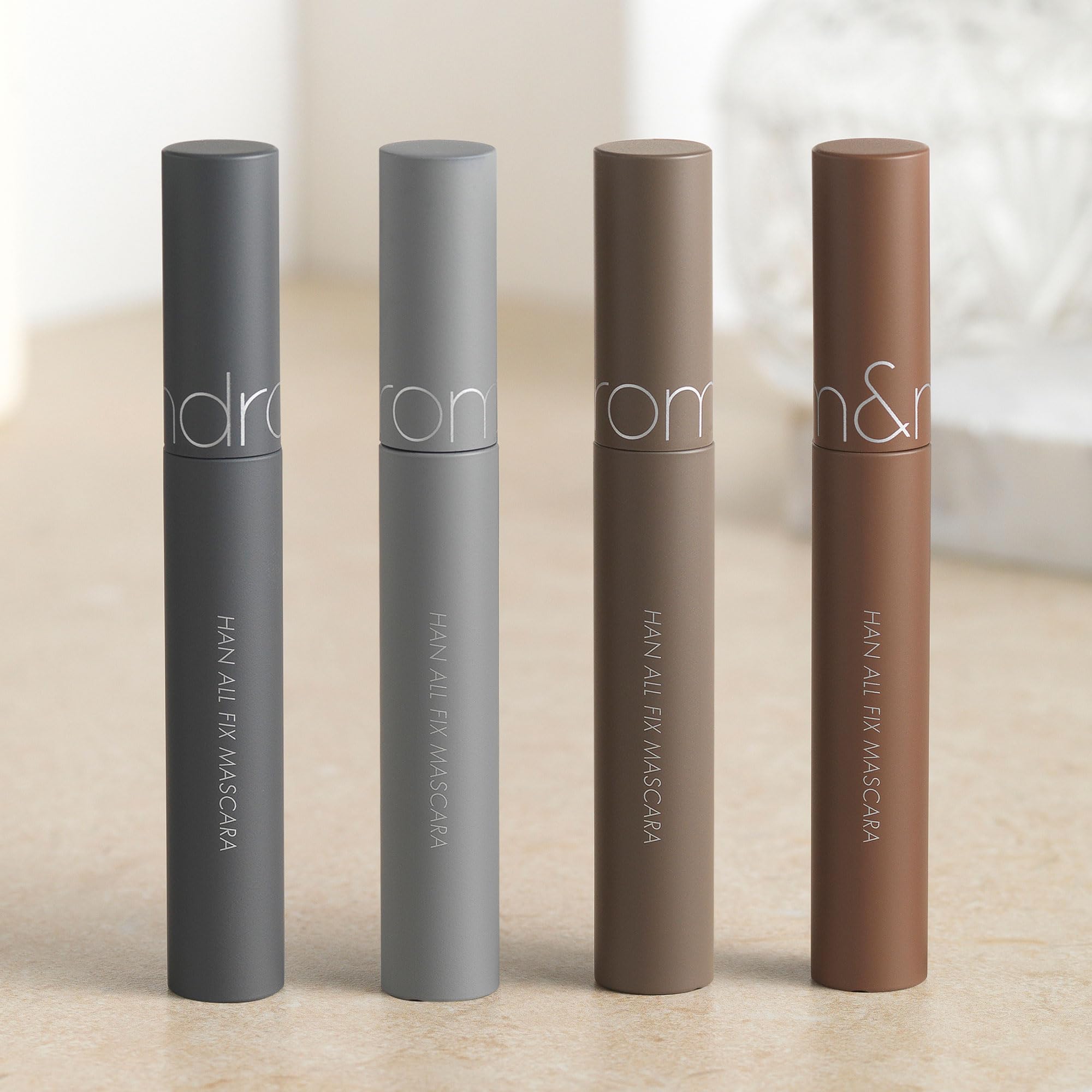 rom&nd HAN ALL FIX MASCARA smudge-proof finish keeps lashes neat during daily activities.