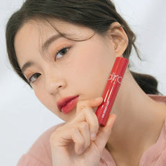 rom&nd Juicy Lasting Tint 06 FIGFIG lip application demonstrating smooth color build